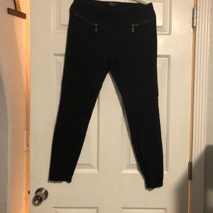 Black legging pants with zippered pockets